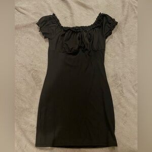 I am selling a fresh and stretchy black dress in a size large.